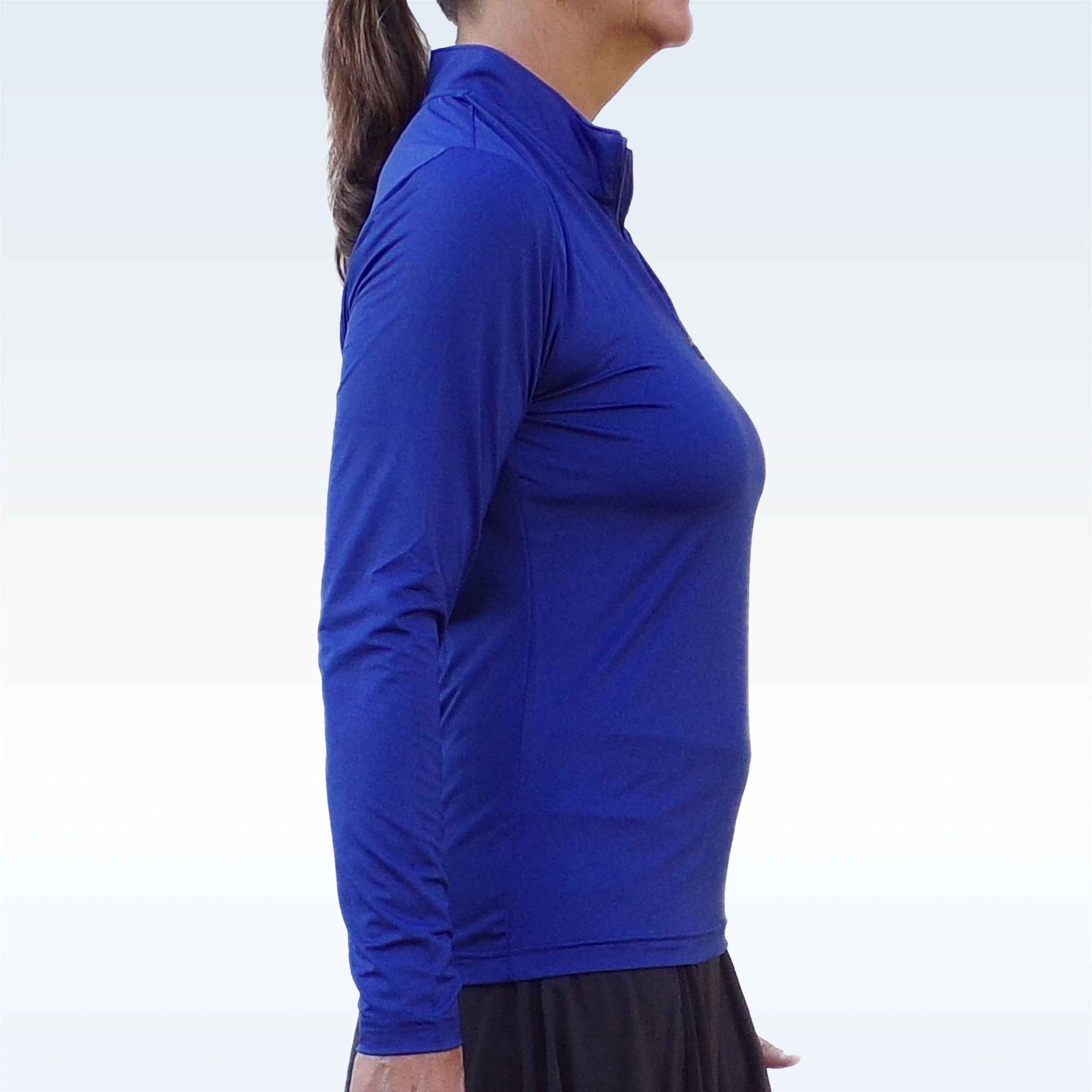 Navy 1/4 zip long sleeve pullover by Pickleball Bella, side view on a woman, with a black skirt.