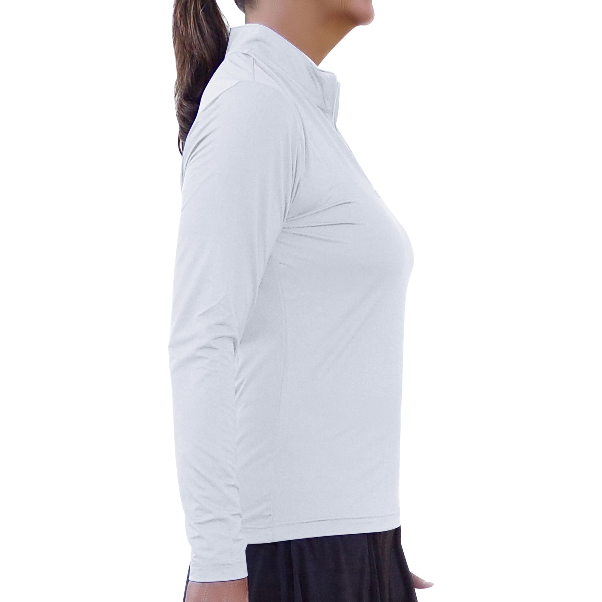 White 1/4 zip long sleeve pullover by Pickleball Bella, shown in a side view on a person wearing a dark skirt.