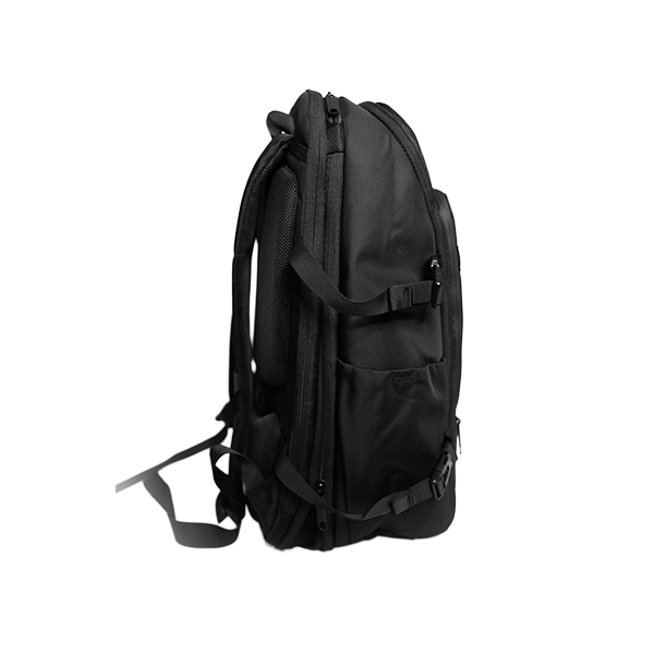 Black fabric backpack by EngagePickleball, side view showing padded back, multiple zippers, and adjustable straps with buckles.