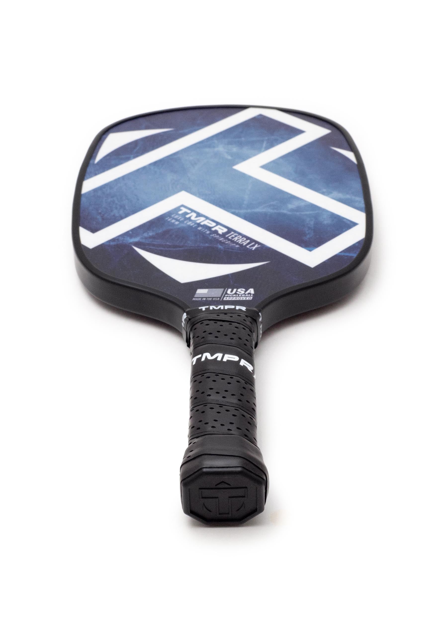 Indigo ice pickleball paddle by TMPR Sports featuring a blue and white geometric pattern and a black perforated grip.