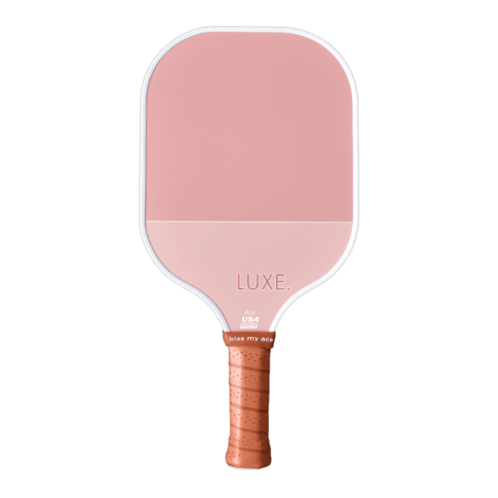 Pink pickleball paddle with brown grip.
