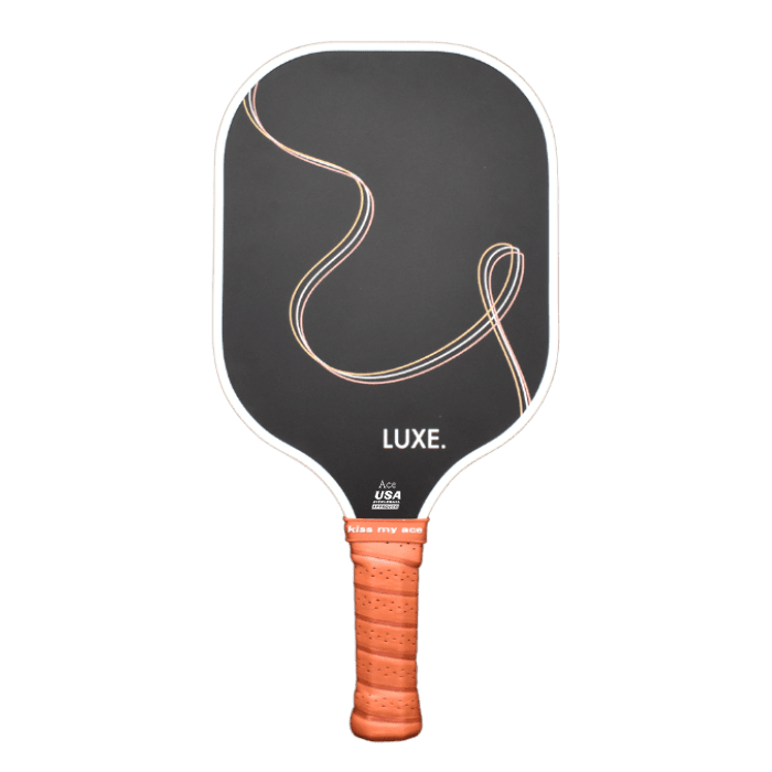 Black pickleball paddle with tan grip.