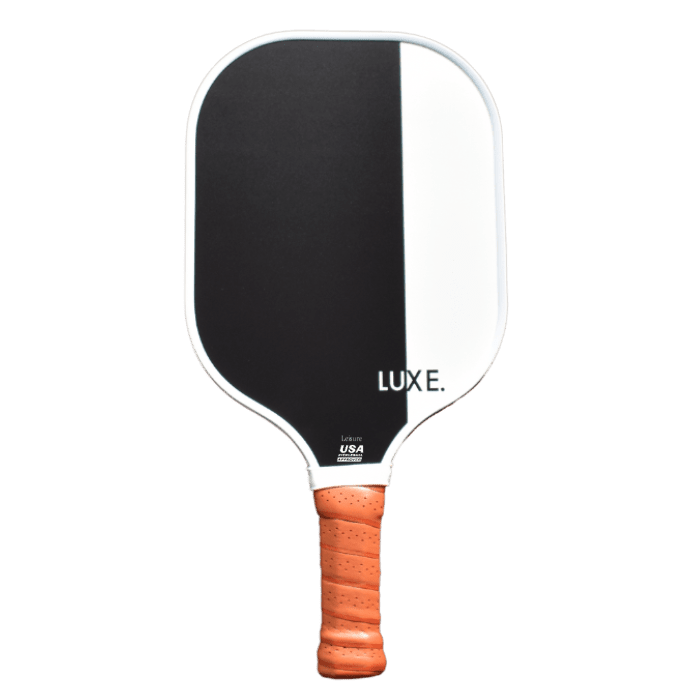 Black and white pickleball paddle with orange handle.