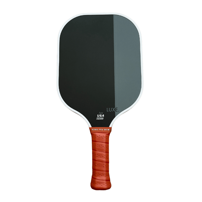 Black and gray pickleball paddle with a textured, orange grip.