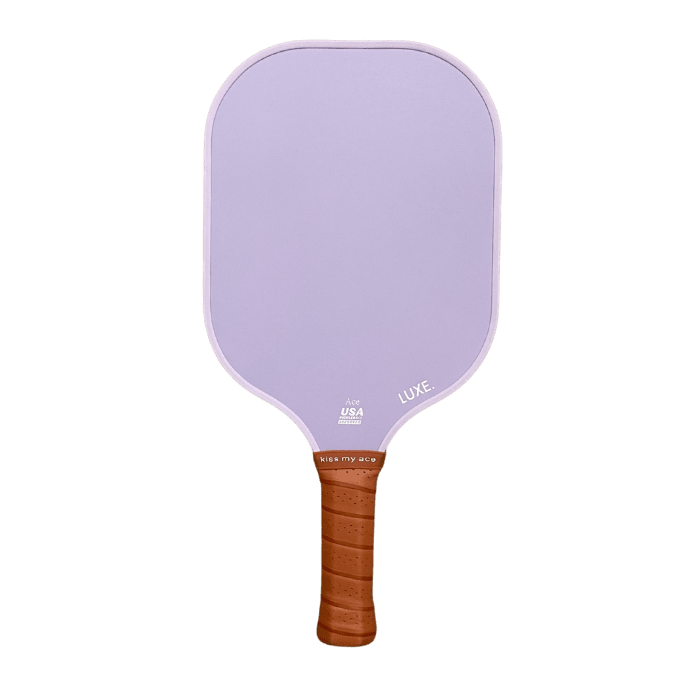 A purple pickleball paddle with a brown handle on a green background.