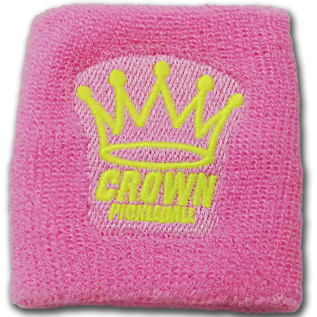 Pink wristband with yellow crown logo.
