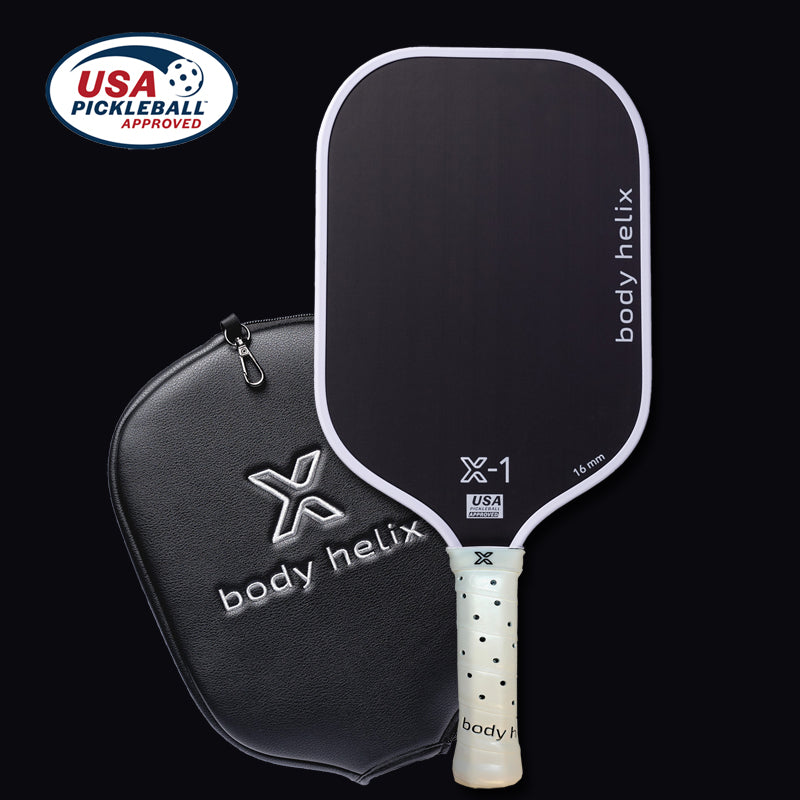 A black and white pickleball paddle with a cover.
