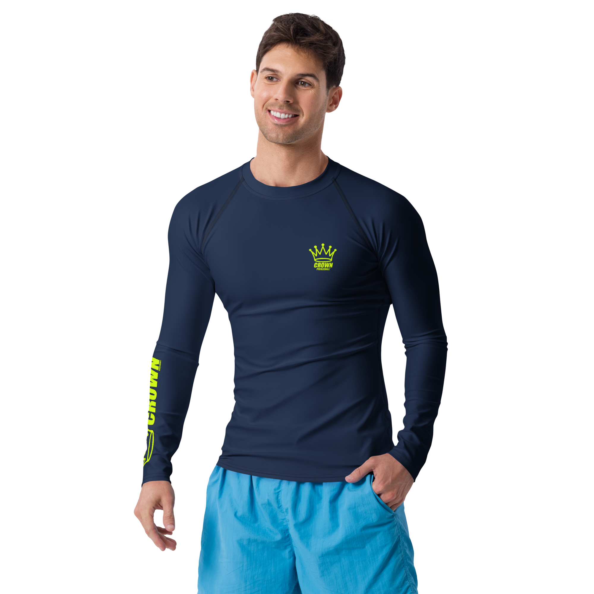 Man wearing a blue rash guard and blue shorts.