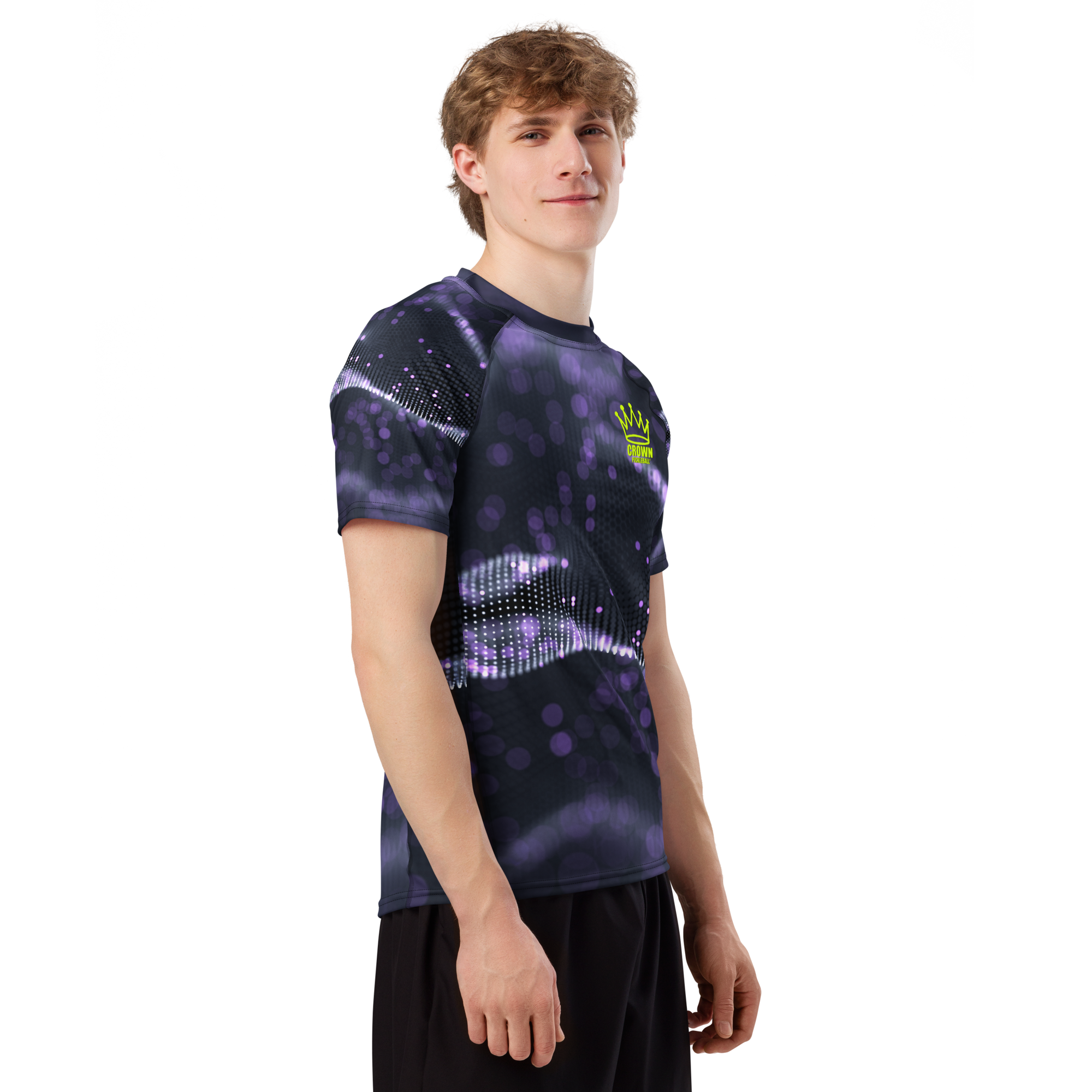 Man wearing a black and purple patterned t-shirt.