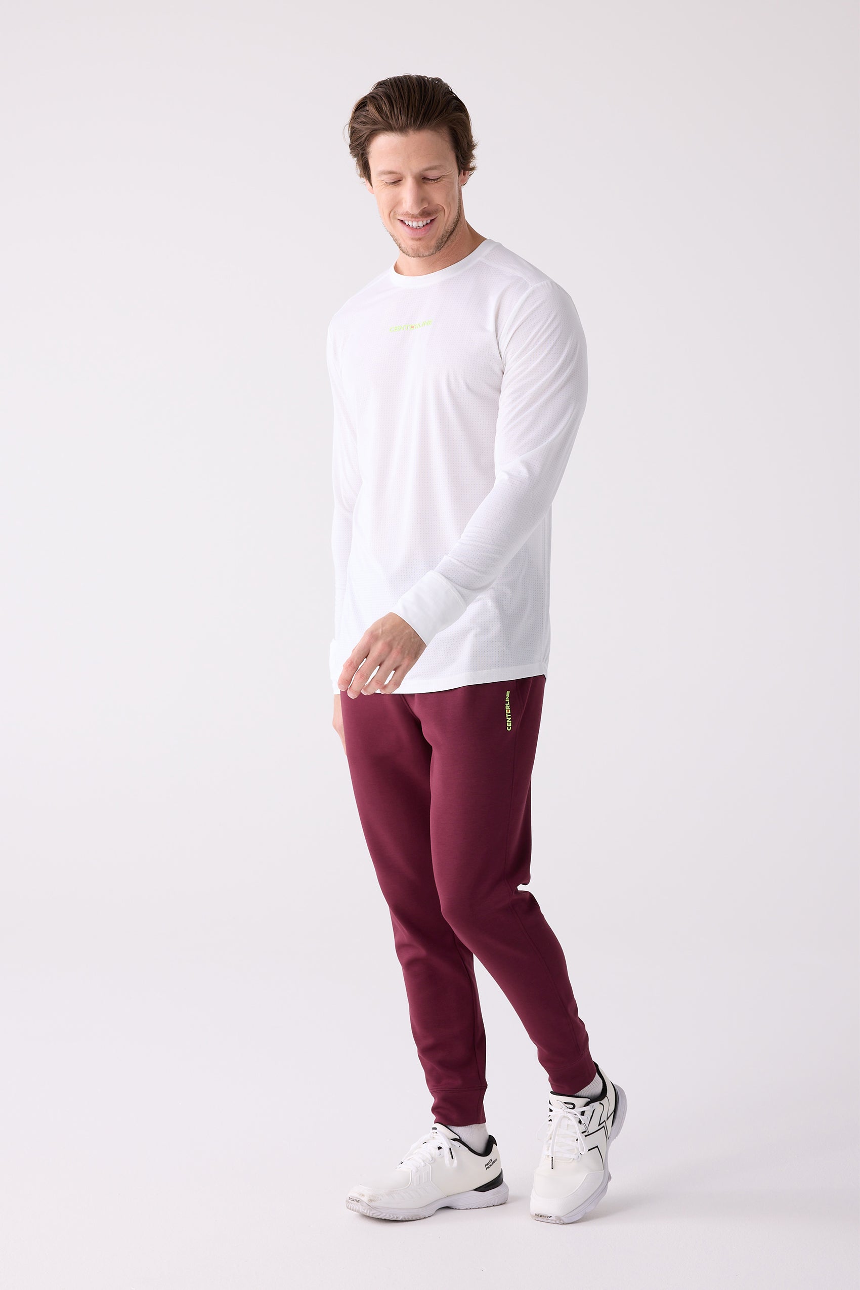 Maroon men's jogger by Centerline Athletics, with neon green vertical brand text on the left thigh.