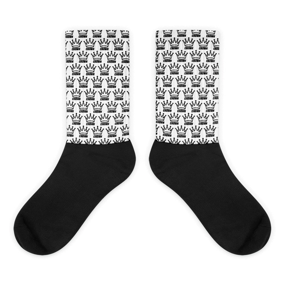 Pair of black socks with white crown pattern.