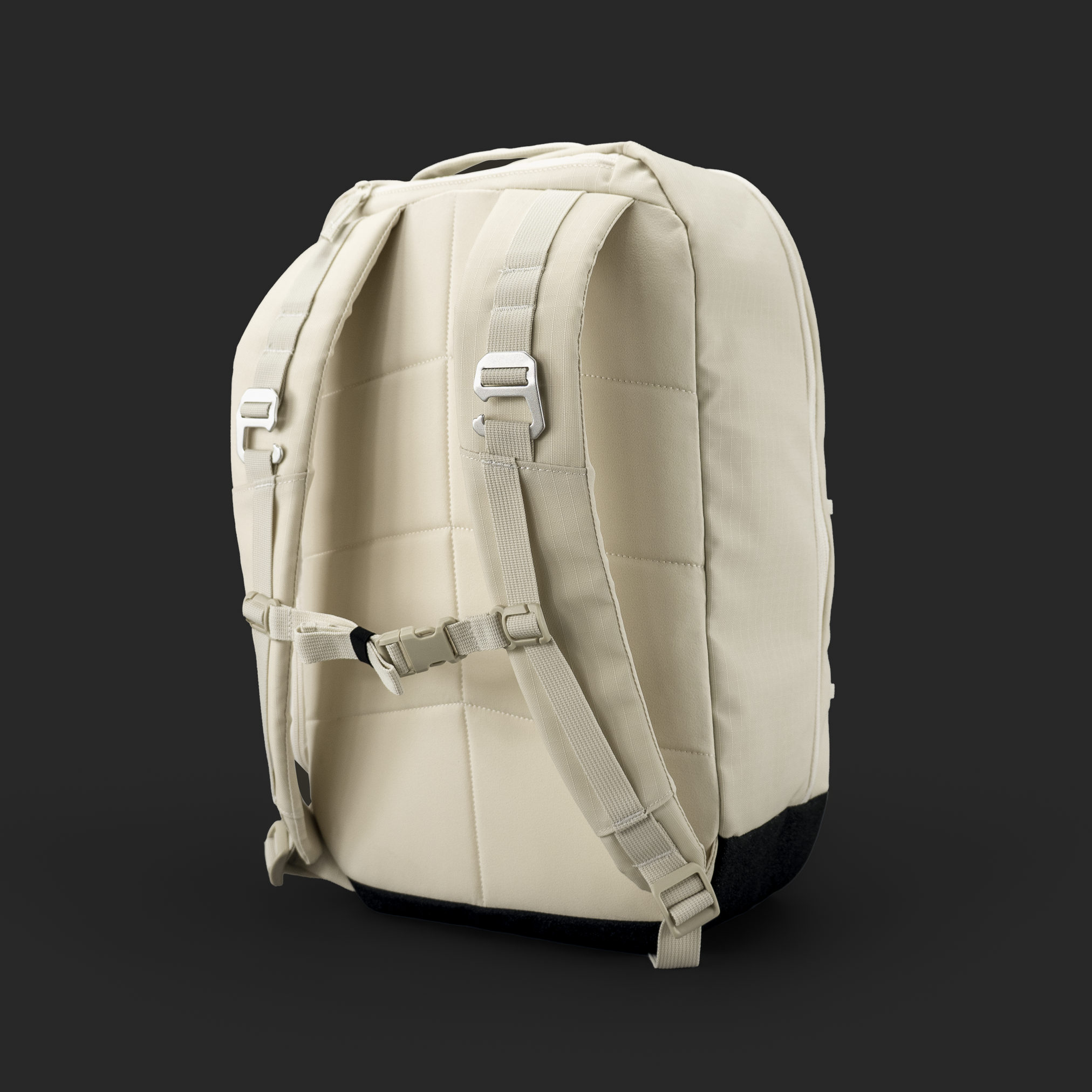 Beige backpack with straps against a black background.