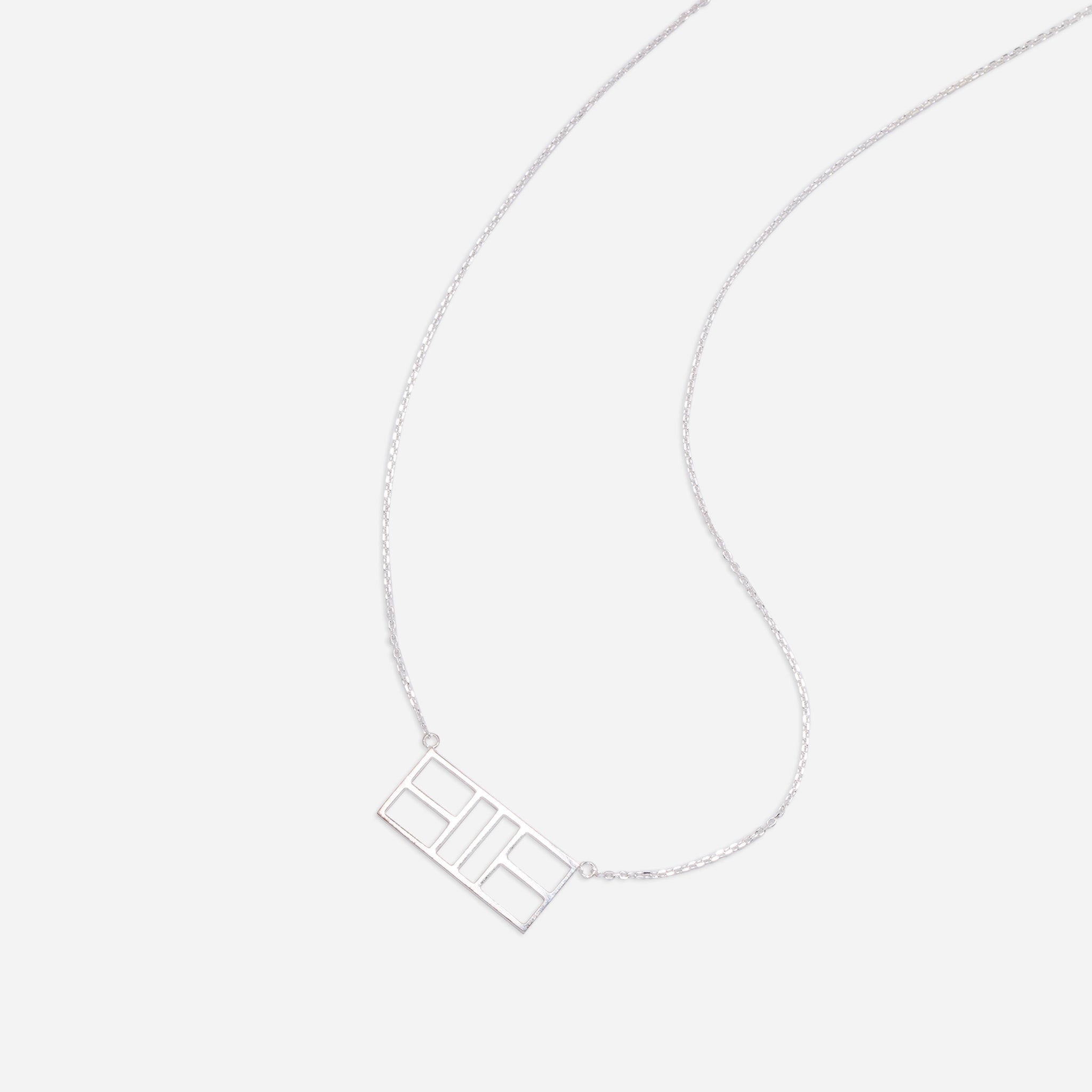 Silver pendant necklace.
