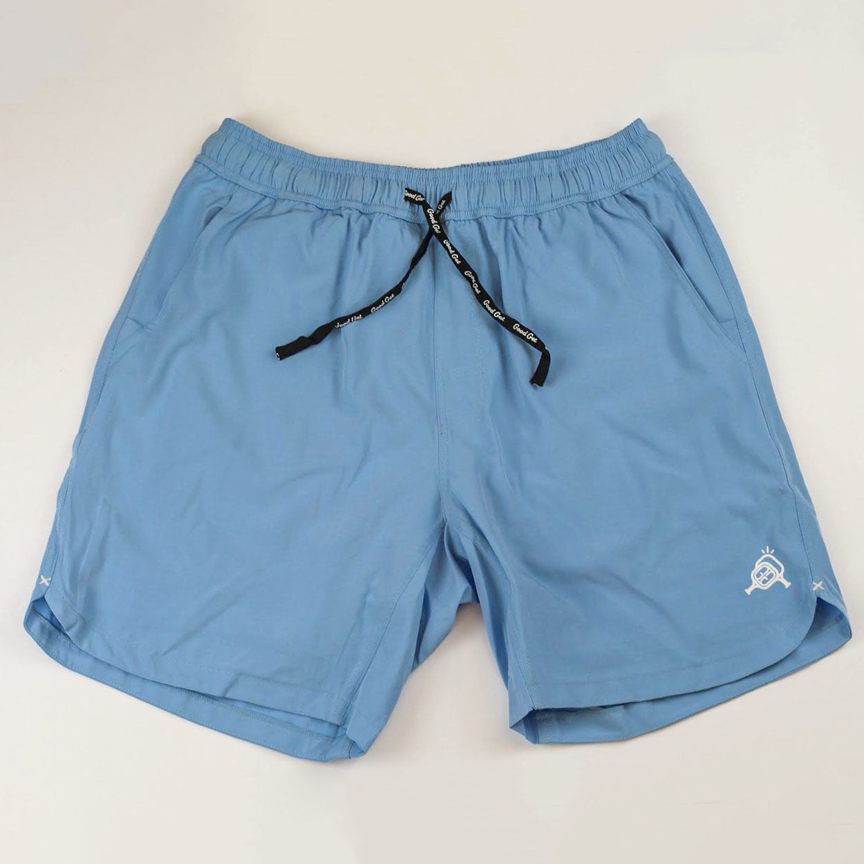 Light blue athletic shorts by Good Get with a black branded drawstring and white logos on the hems.