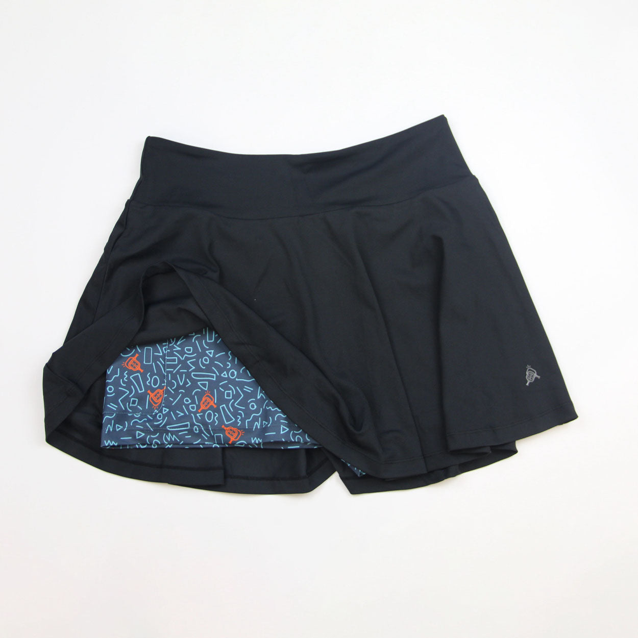 Black Women's Skirt by Good Get, with built-in blue shorts featuring an orange and light blue abstract pattern and a subtle logo on the hem.